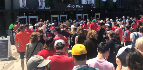 Fans lining up to enter Providence Park for the Pride-Thorns match.